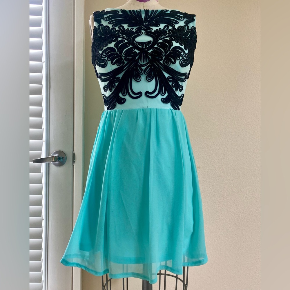 Elegant Blue: Black and Teal Dress. Size small